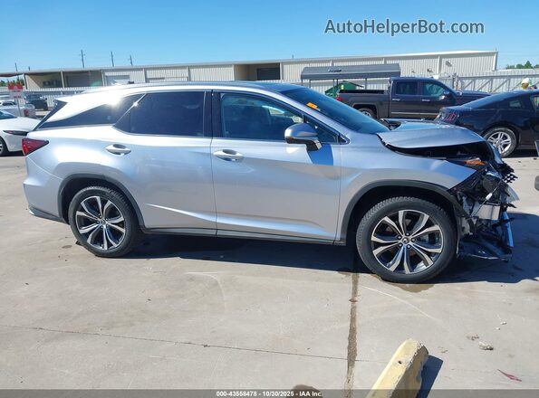JTJHZKEAXN2024921 2022 LEXUS RX 350L Серебряный Вид задней части салона