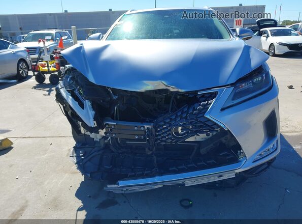 JTJHZKEAXN2024921 2022 LEXUS RX 350L Серебряный Вид щитка приборов