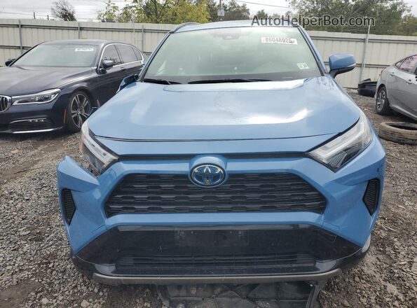 JTM16RFV7PD079762 2023 TOYOTA RAV4 Синий Вид спереди