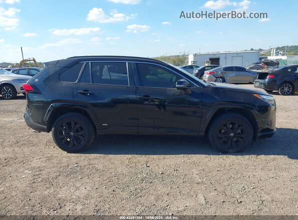 JTM16RFV7PD115031 2023 TOYOTA RAV4 HYBRID Black Widok wnętrza z tyłu
