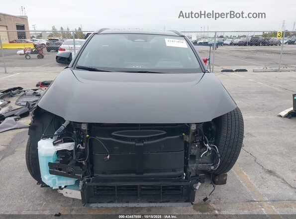 JTMABACA8SA105472 2025 TOYOTA BZ4X Black Вид задньої частини салону