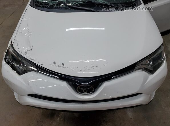 JTMBFREV1JJ220405 2018 TOYOTA LE White Engine compartment view