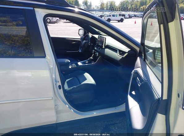 JTME6RFV1ND534619 2022 TOYOTA RAV4 HYBRID White Вид салону спереду
