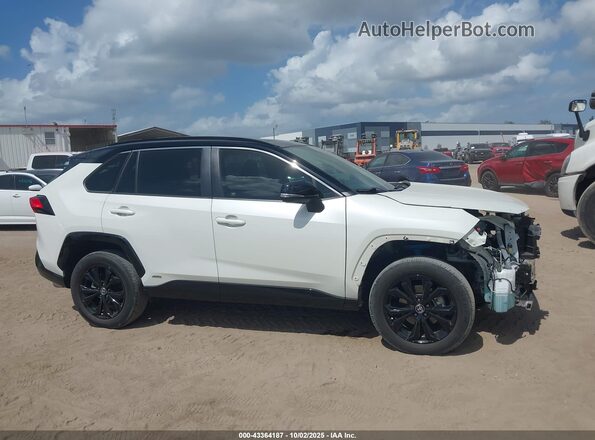 JTME6RFV6ND522238 2022 TOYOTA RAV4 HYBRID White 360 interior view
