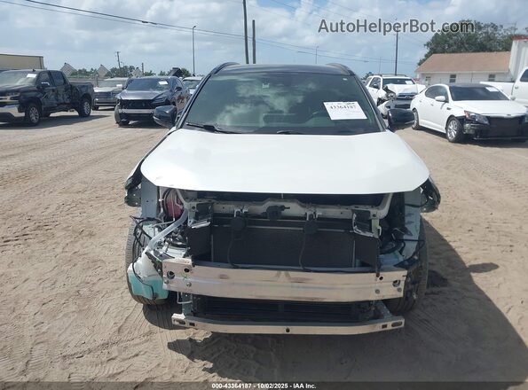 JTME6RFV6ND522238 2022 TOYOTA RAV4 HYBRID White Rear interior view