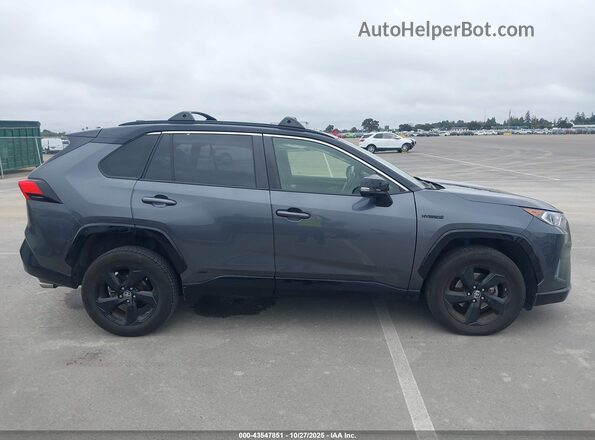JTMEWRFV1KD524572 2019 TOYOTA RAV4 HYBRID Gray Widok wnętrza z tyłu