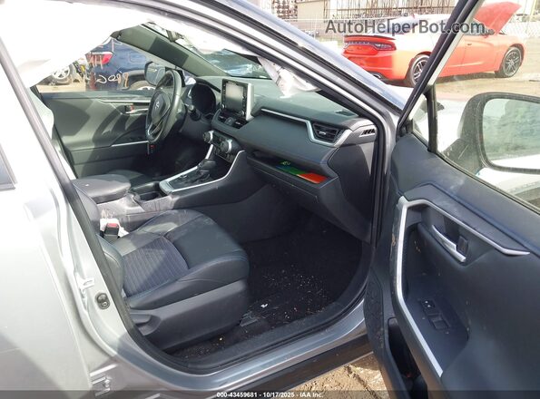 JTMEWRFV2KJ024423 2019 TOYOTA RAV4 HYBRID Silver Front interior view