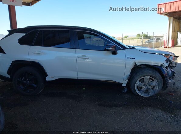JTMEWRFV8KJ019310 2019 TOYOTA RAV4 HYBRID White Вид задньої частини салону