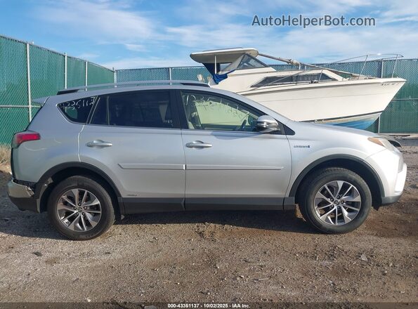 JTMRJREV8GD011439 2016 TOYOTA LE Серебряный Вид задней части салона