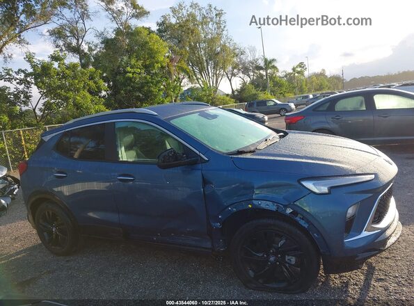 KL4AMDSL4SB119243 2025 BUICK ENCORE Light Blue Вид задньої частини салону