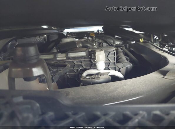KL77LHE23RC196779 2024 CHEVROLET TRAX Green Вид ззаду