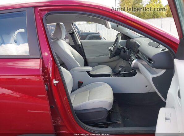 KM8HA3AB9RU122603 2024 HYUNDAI KONA Burgundy Вид салону спереду