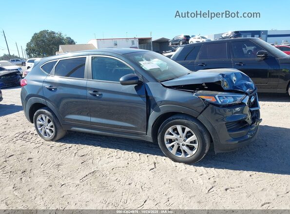 KM8J23A49LU188947 2020 HYUNDAI TUCSON Navy Rear interior view