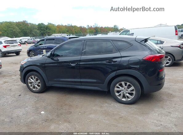 KM8J2CA48MU373363 2021 HYUNDAI TUCSON Black Widok wnętrza z tyłu