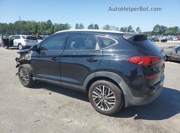 KM8J3CA45LU185749 2020 HYUNDAI TUCSON Black Trasero izquierdo