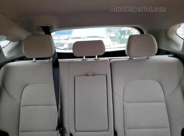 KM8J3CA46LU252634 2020 HYUNDAI TUCSON Burgundy Rear seats view