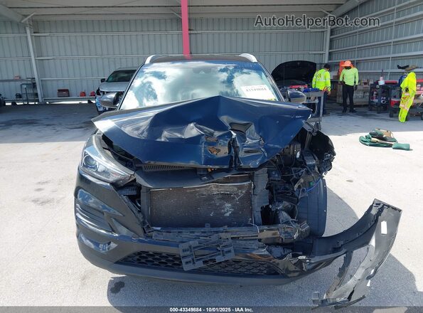 KM8J3CA48LU272383 2020 HYUNDAI TUCSON Black Vista interior trasera