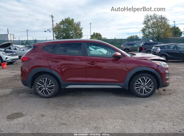 KM8J3CAL7LU149519 2020 HYUNDAI TUCSON Burgundy Vista interior trasera