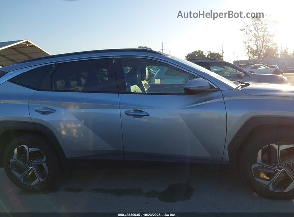 KM8JCCD19RU178166 2024 HYUNDAI TUCSON HYBRID Silver Սալոնի հետևի տեսք