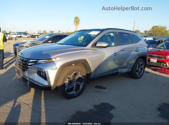 KM8JCCD19RU178166 2024 HYUNDAI TUCSON HYBRID Silver Առջևի ձախ երեք քառորդ տեսարան