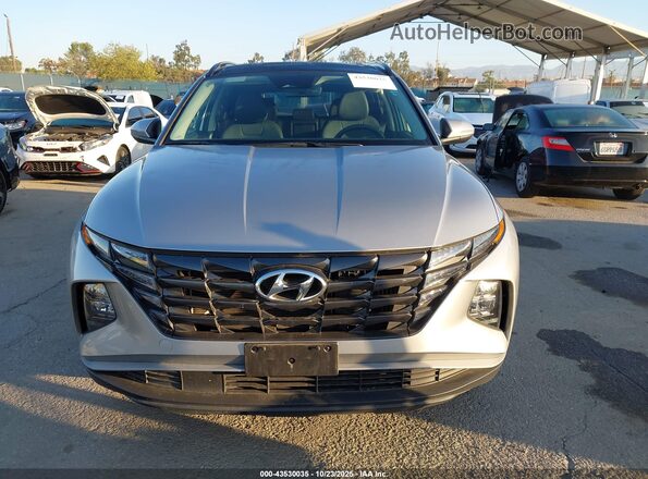 KM8JCCD19RU178166 2024 HYUNDAI TUCSON HYBRID Silver Սարքավորումների վահանակի տեսք