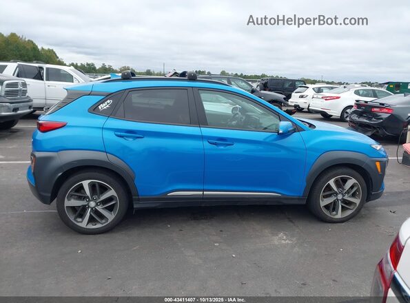 KM8K53A59LU532572 2020 HYUNDAI KONA Light Blue Vista interior trasera