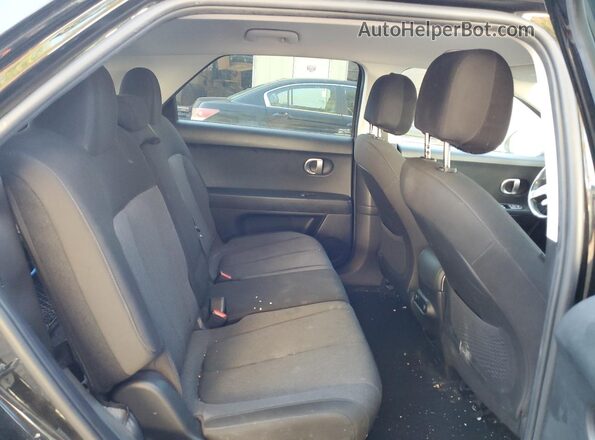 KM8KMDAF0NU100067 2022 HYUNDAI IONIQ Black Vista interior trasera