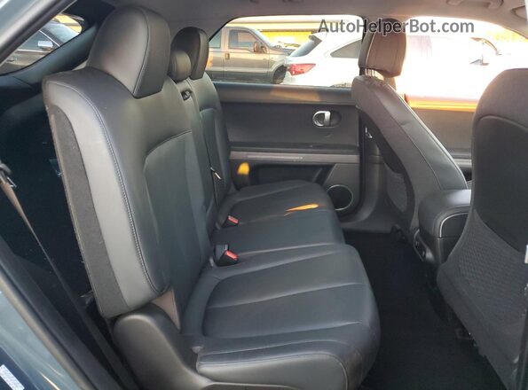 KM8KNDAF4PU148364 2023 HYUNDAI IONIQ Green Widok wnętrza z tyłu