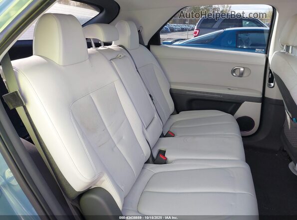 KM8KNDAF4PU203072 2023 HYUNDAI IONIQ 5 Blue Вид наклейки з VIN-кодом