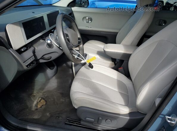 KM8KNDAF4PU208448 2023 HYUNDAI IONIQ Blue Front interior view