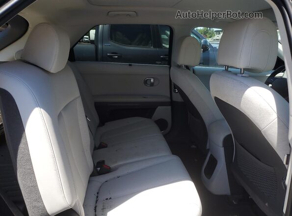 KM8KRDAFXPU154402 2023 HYUNDAI IONIQ Black Vista de los asientos traseros
