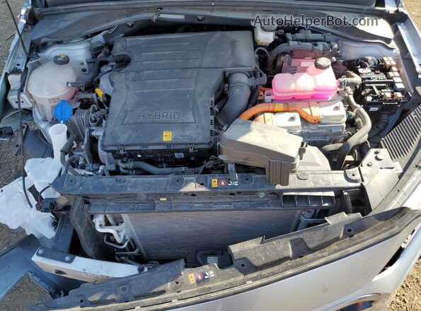 KMHC65LC8NU274329 2022 HYUNDAI IONIQ Silver Widok wnętrza z tyłu