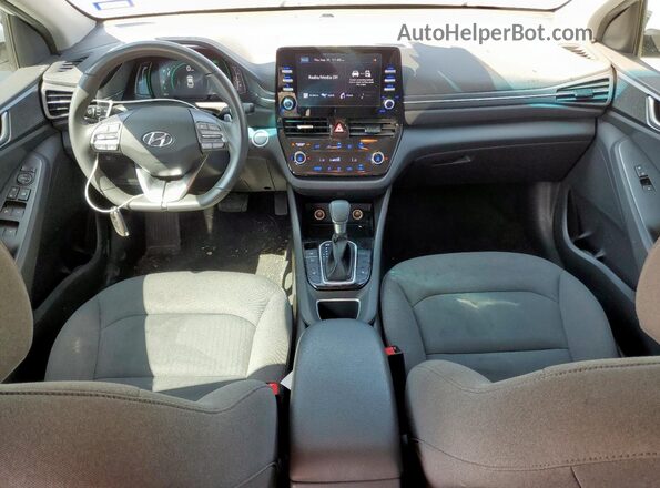 KMHC75LC6MU260800 2021 HYUNDAI IONIQ Белый Вид панели приборов