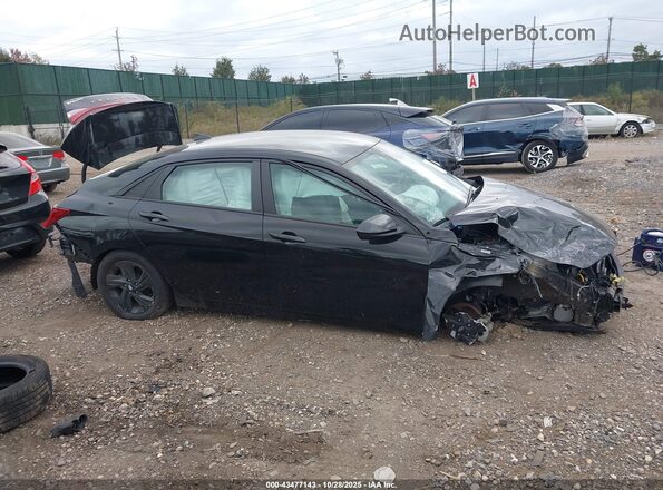 KMHLM4AJ2PU040336 2023 HYUNDAI ELANTRA HYBRID Black Вид задньої частини салону