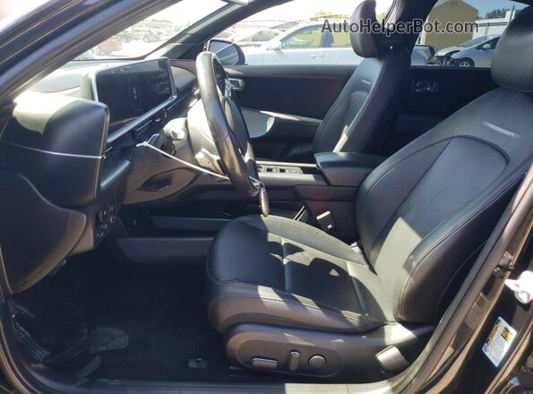 KMHM34AA0PA021681 2023 HYUNDAI IONIQ Black Widok wnętrza z przodu