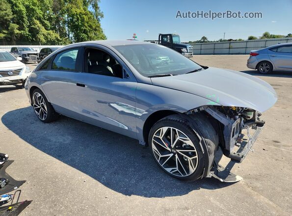 KMHM34AA7SA090568 2025 HYUNDAI IONIQ Gray Delantero derecho