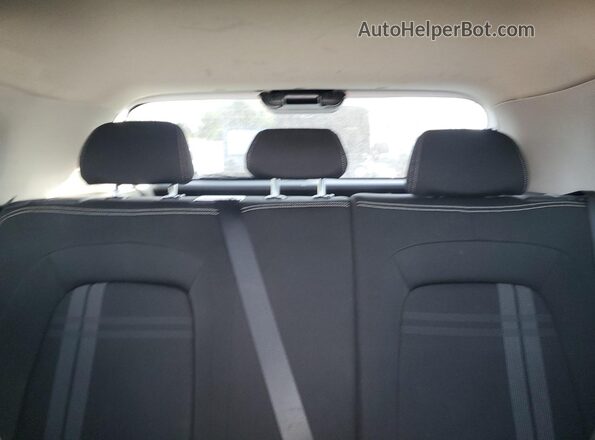 KMHRC8A32MU083592 2021 HYUNDAI VENUE White Rear seats view