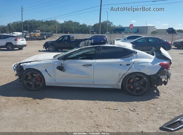 KMTG34LE1MU074063 2021 GENESIS G70 White 360 interior view