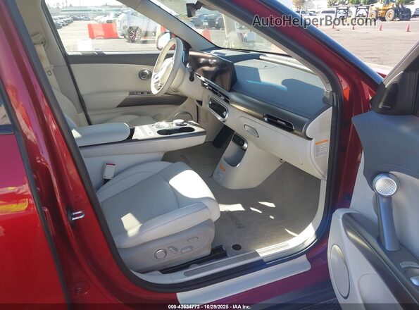KMUKCDTC1PU018049 2023 GENESIS GV60 Red Widok wnętrza z przodu