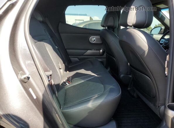 KMUKCDTC6PU005961 2023 GENESIS GV60 Gray Rear seats view