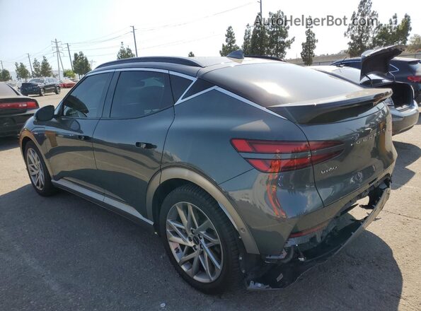 KMUKCDTC6PU005961 2023 GENESIS GV60 Gray Rear left