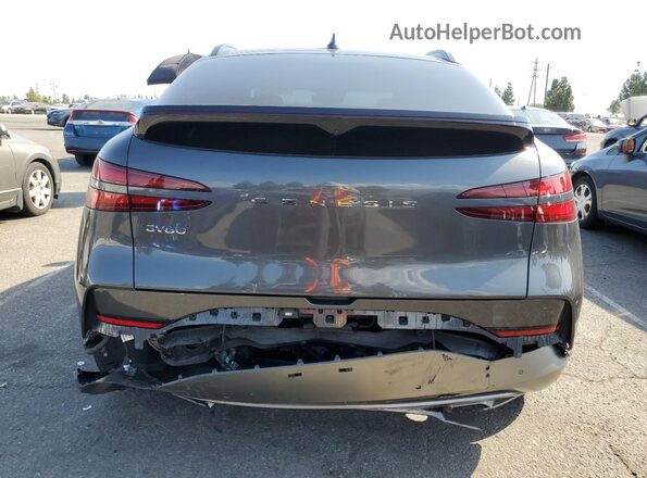 KMUKCDTC6PU005961 2023 GENESIS GV60 Gray Rear view