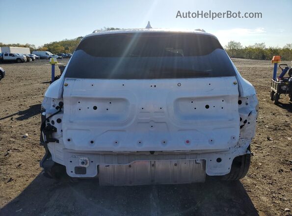 KMUMADTB6PU129167 2023 GENESIS GV70 White Rear view