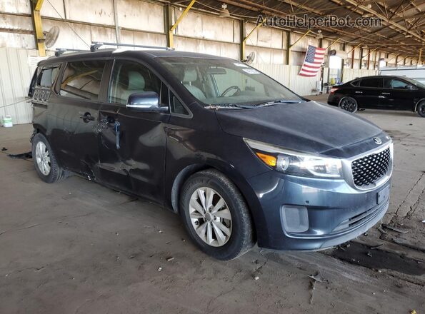KNDMB5C10H6311000 2017 KIA SEDONA Black Front right