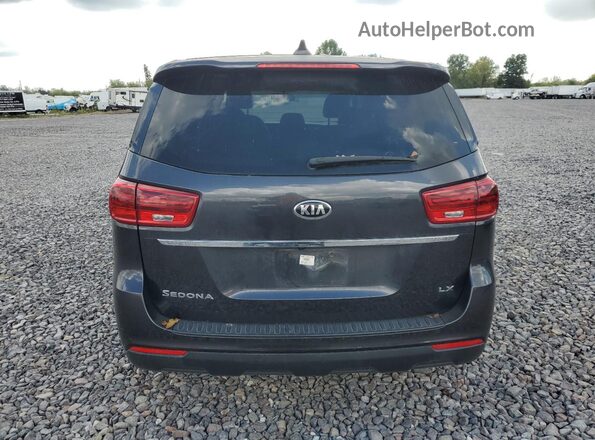 KNDMB5C10K6569234 2019 KIA SEDONA Black Rear view