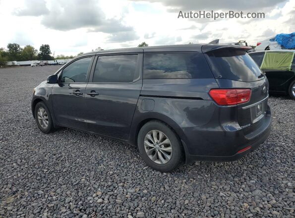 KNDMB5C10K6569234 2019 KIA SEDONA Black Rear left