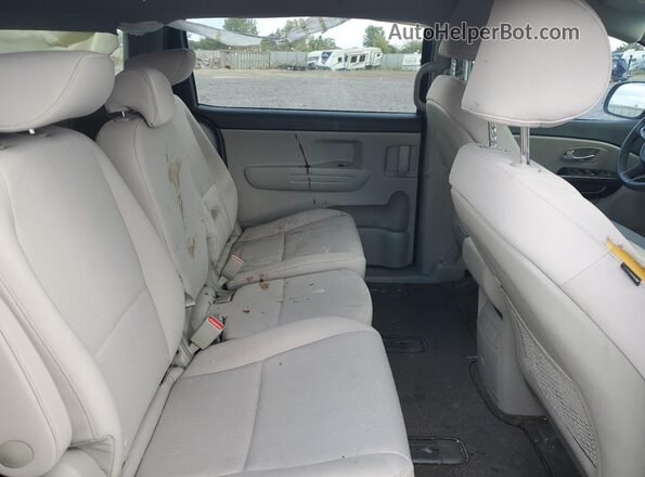 KNDMB5C10K6569234 2019 KIA SEDONA Black Rear interior view