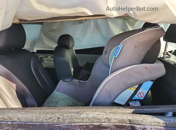 KNDNB4H37R6321341 2024 KIA CARNIVAL Синий Вид задней части салона