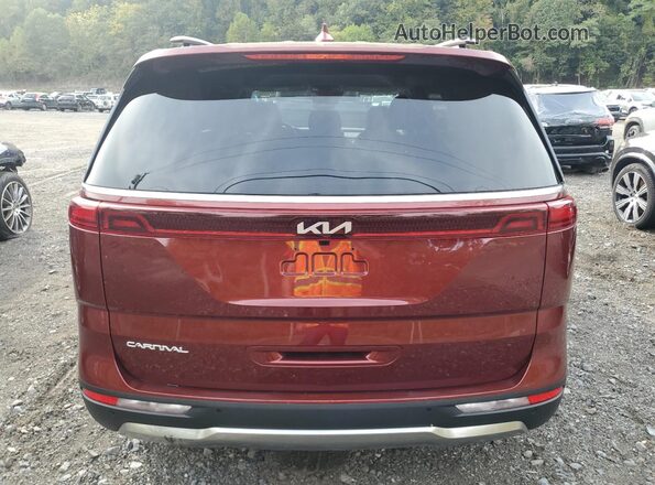 KNDNE5H32P6276125 2023 KIA CARNIVAL Бордовый Вид сзади