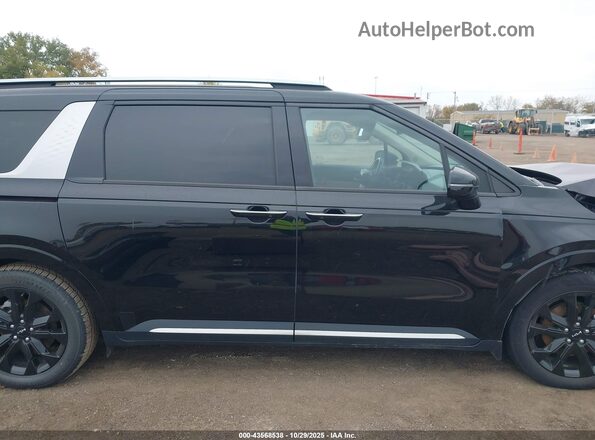 KNDNE5H35P6288298 2023 KIA CARNIVAL MPV Черный Вид задней части салона